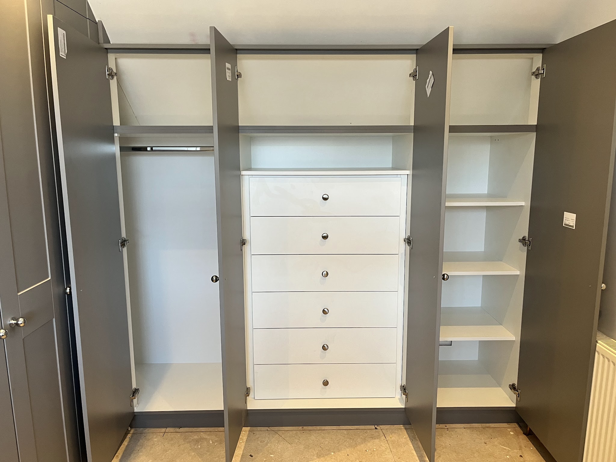 Fitted wardrobe interiors with hanging rail, internal drawers and adjustable shelves